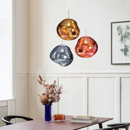 Maribel melt pendant – mixed finishes over a dining table