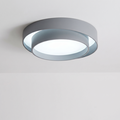 Aurora concentric ring LED ceiling light in grey, cool white light, on a white ceiling