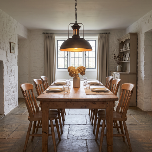 Tobias bronze dome pendant – glowing above a farmhouse table
