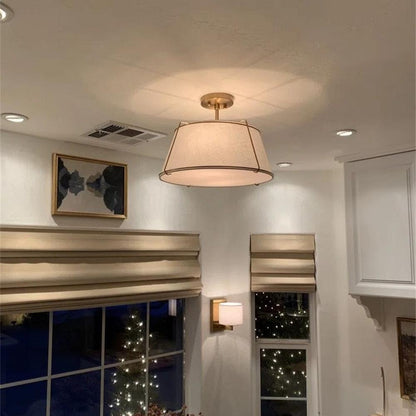 Theodora tapered drum ceiling light – above a kitchen bar area