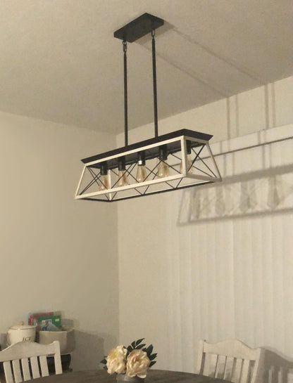 Lysander linear chandelier – over a table in a bright room