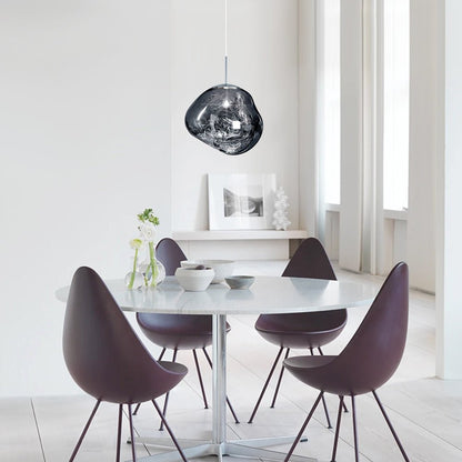 Maribel melt pendant – in silver over a dining table