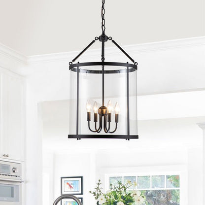 Tristan glass lantern chandelier – in black in a bright room