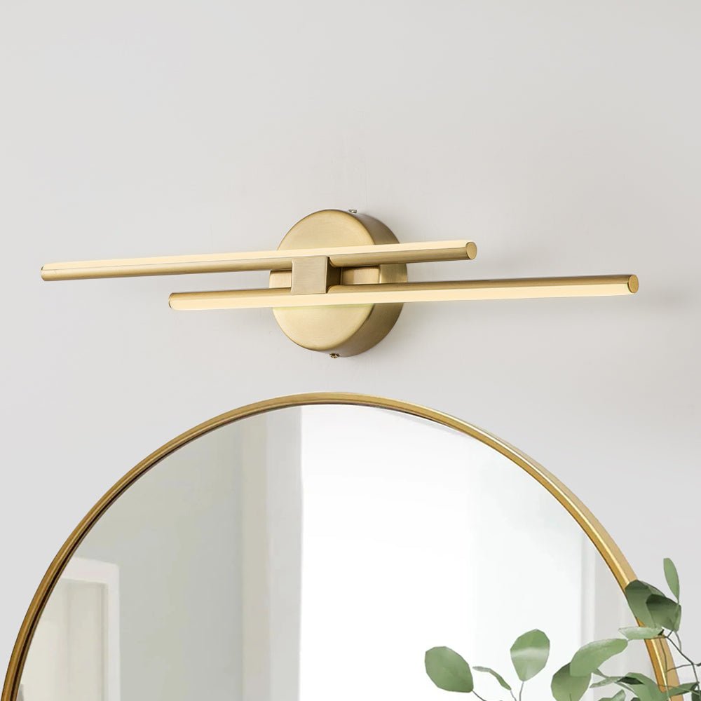 Priscilla linear LED wall light – gold above a round mirror