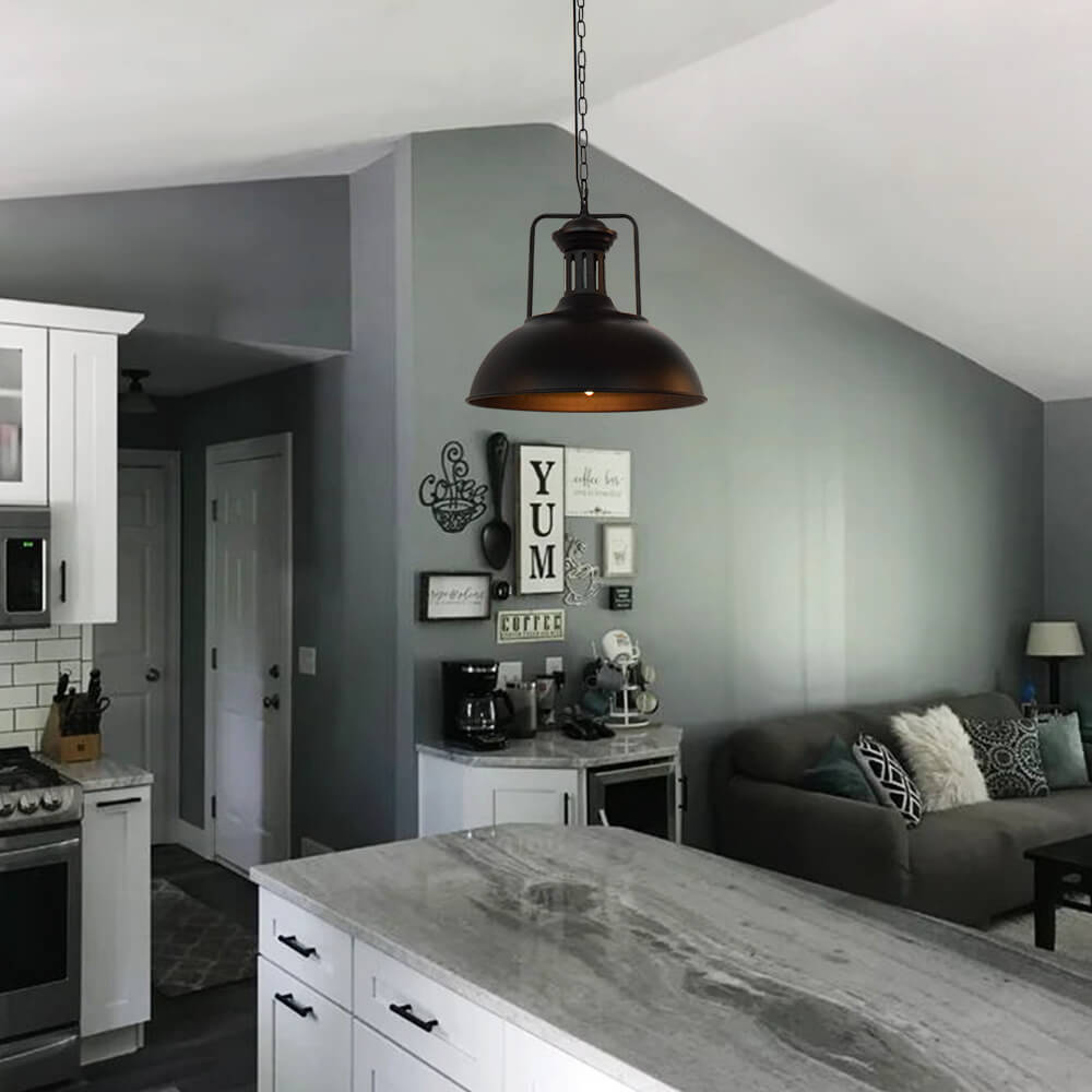 Hugo black dome pendant light in an open-plan grey living space