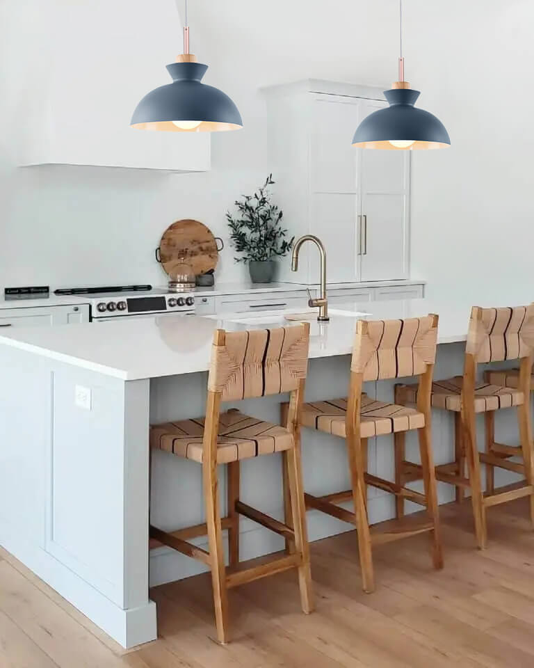 Two Solene blue dome pendant lights above a kitchen island