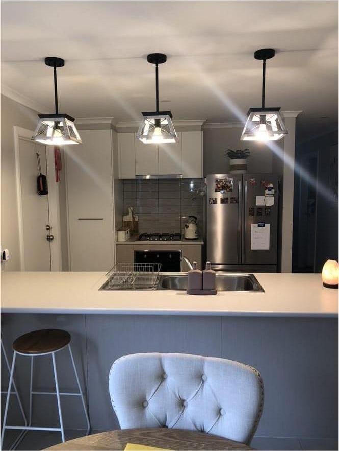 Horatio square cage pendant light – three whitewashed in a kitchen